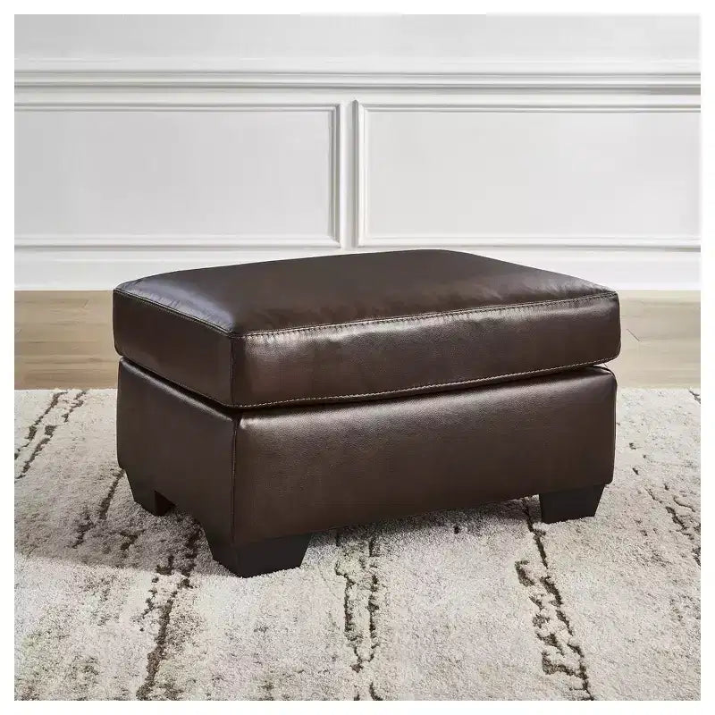 Ottoman en cuir marron foncé